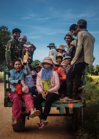 Cover photo: Muse Mohammed/IOM. Siem Reap, Cambodia. Description: Rice paddy workers head home to their villages after a day of working in the rice fields in Siem Reap province.